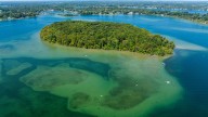 Boat tours offer rare glimpse of island in the middle of Orchard Lake