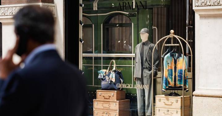 Why did Giorgio Armani abandon 50 years of independence in his final will?