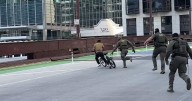 Man on e-bike taunts ICE agents in Chicago — and gets away