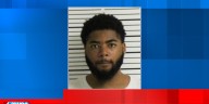 Man charged in Davenport house shooting