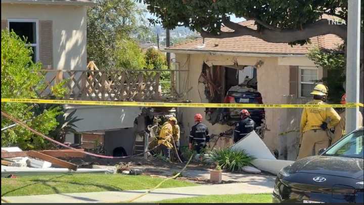 BMW crashes into 2 homes in View Park
