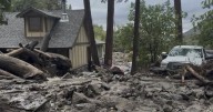 Mudslides trap drivers, bury roads and damage homes in southern California