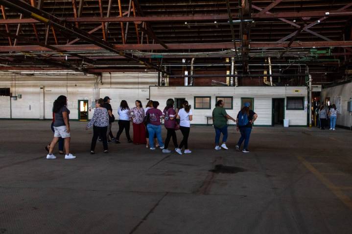 Redlands school employees tour old packinghouse that will be new headquarters