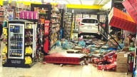 Two taken to hospital after car crashes into Dollar General in Mahoning Plaza