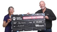 The Game: Fremantle Dockers supporter Jan Garwell takes home $50,000 as top tipper, thanks to TABtouch