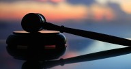 Court hears son threatened to 'kneecap' mother with fake gun