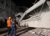 Indonesia rescuers hunt for 38 feared trapped after school collapse kills three