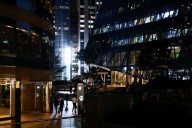 Hong Kong central bank cuts interest rate, tracking Fed move