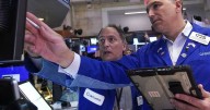 Wall St ends higher after as-expected inflation data