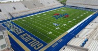 Navy center Toran Smith is the son of former Tulsa lineman Brad Smith, and both beat OU