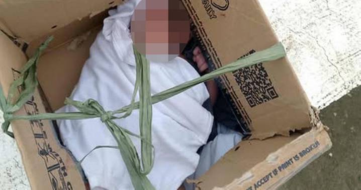 Baby girl found dumped in cardboard box at side of the road