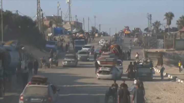 Israeli troops press forward into Gaza City as Palestinians flee