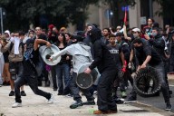 Mass protests erupt across Italy sparking clashes with police