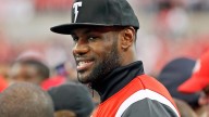 LeBron James’ unfazed reaction to Lakers fan running on stage is a new meme
