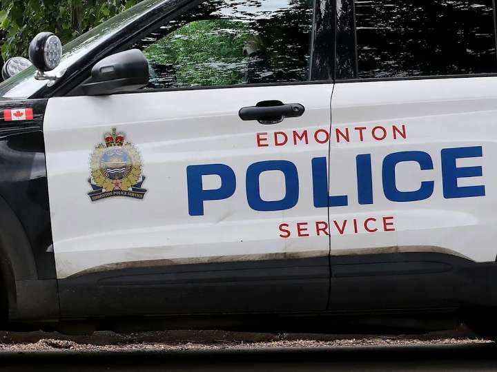 Edmonton police charge two men with first-degree murder after woman slain