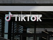Deal for TikTok creates U.S. joint venture, and government won't have a stake