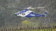 Fugitive hunt enters third week after teary farewells