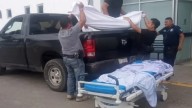 Trasladan cadáver en batea de camioneta; Fiscalía de Puebla fija postura