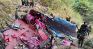 Deadly passenger bus accident as it drops 1,000ft killing 15 and leaving 16 injured
