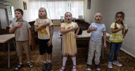 Russia 're-educating' snatched Ukraine children with military combat training