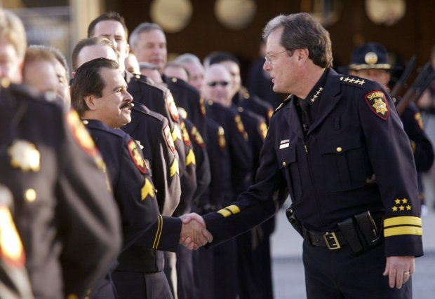 From brothels and Batmobiles to Corpus removal hearings, a long line of scandals has plagued the San Mateo County Sheriff’s Office. What’s the solution?