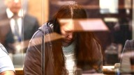 Woman goes on trial in New Zealand accused of murdering her children whose bodies were found in suitcases