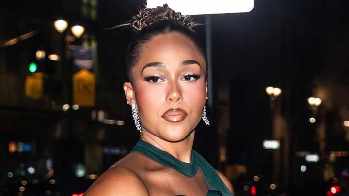 Jordyn Woods gives glimpse of underboob in turquoise gown as she struts into New York Fashion Week bash