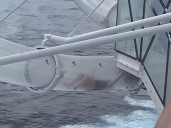 Woman's cruise ship waterslide ride ends awkwardly above the ocean