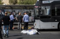 Palestinian gunmen kill 6 people in attack on Jerusalem bus stop