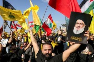 Hezbollah says it refuses to be disarmed one year after leader’s killing