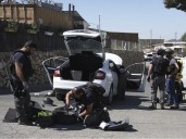 2 people are stabbed at a hotel outside Jerusalem.