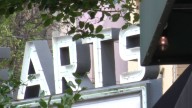 Artists return to flooded Asheville district devastated by Hurricane Helene