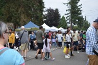 Thousands braved the rain Saturday for Lynnwood’s seventh annual Fair on 44th