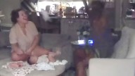 Hilarious moment ex-NFL star Shaq Barrett jumps out of chair to avoid baby poo while changing diaper