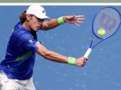De Minaur targets quarter-final jinx after Riedi romp