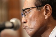 Chief of Japanese beverage giant Suntory claims innocence after resigning over CBD supplement