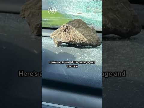 Rock thrown at moving car smashes driver's windshield