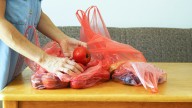 Upcycle All Your Plastic Bags Into Decorative Pillows With A Dollar Tree DIY