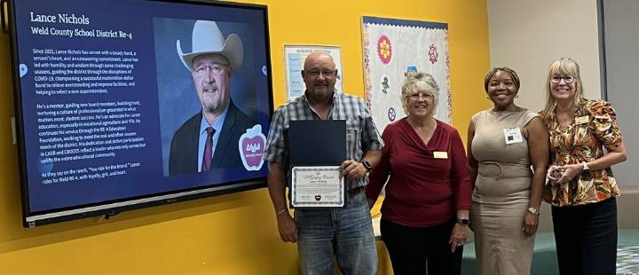RE-4 School Board president honored for work in Windsor, Severance