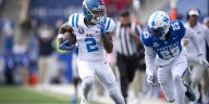 Ole Miss holds off Kentucky to open SEC play