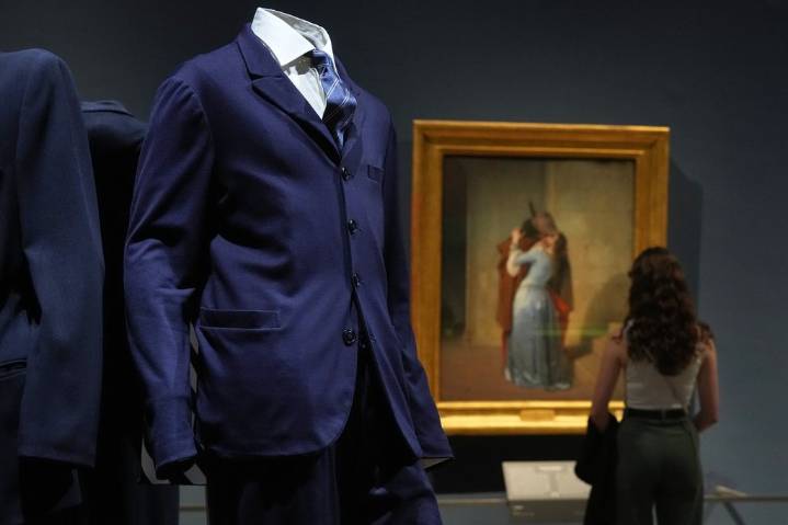 Giorgio Armani’s sartorial creations interplay with Italian masterpieces at Milan museum exhibition
