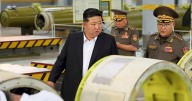 North Korean leader inspects new missile factory ahead of visit to China