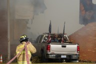 1 person dead and 9 injured in a shooting and fire at a Michigan church, police say