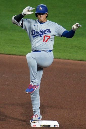 Dodgers star Shohei Ohtani, fighting an illness, has 2 hits after opting not to pitch vs. Pirates