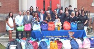 Middlebury Law Firm Delivers Backpacks to Waterbury School System and Local Family
