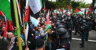 Police clash with pro-Palestine protestors as major sporting event stopped