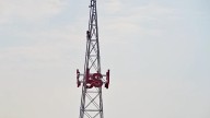 Person climbing Lamar State College-Port Arthur radio tower