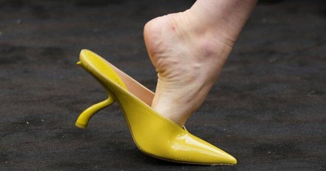 Ferragamo's chartreuse bags and shoes pop against 1920s