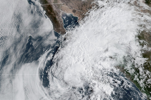 Lorena is downgraded to a tropical storm but still poses a flooding and mudslide threat to Mexico