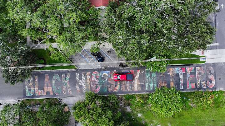 Charges dropped for pastors who blocked Black History mural removal